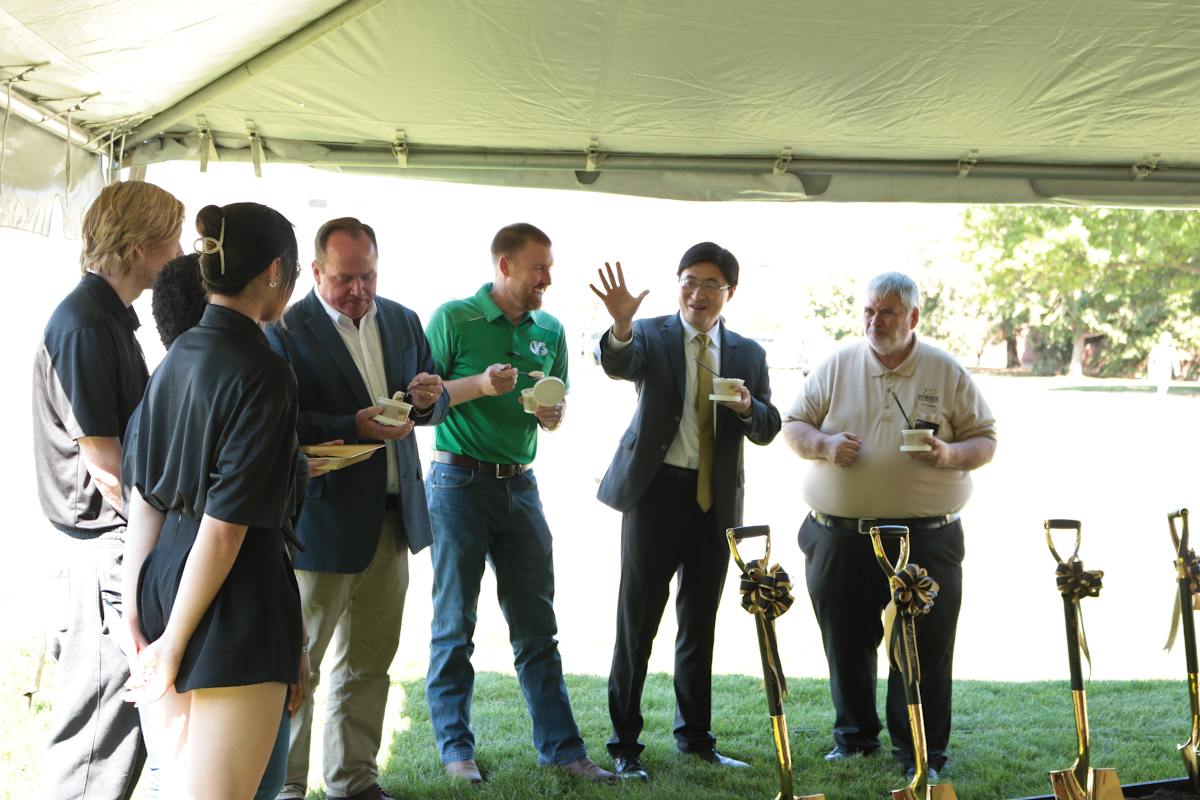 President Mung Chiang, Bernie Engel, Mitch Tuinstra, and Bill Stumph celebrate with the new Boiler Chip ice cream
