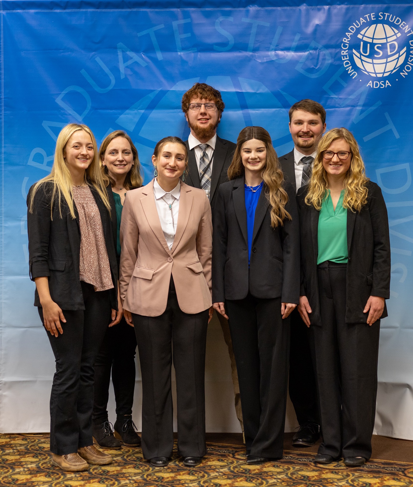 a group of people smiling