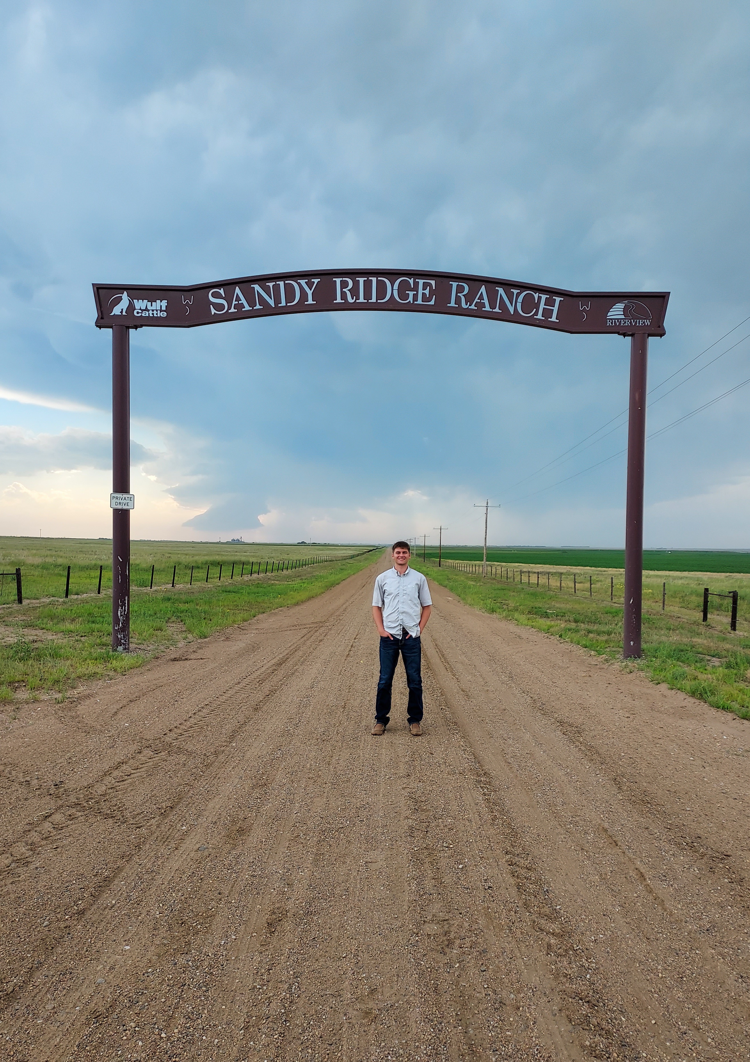 a man standing on a road