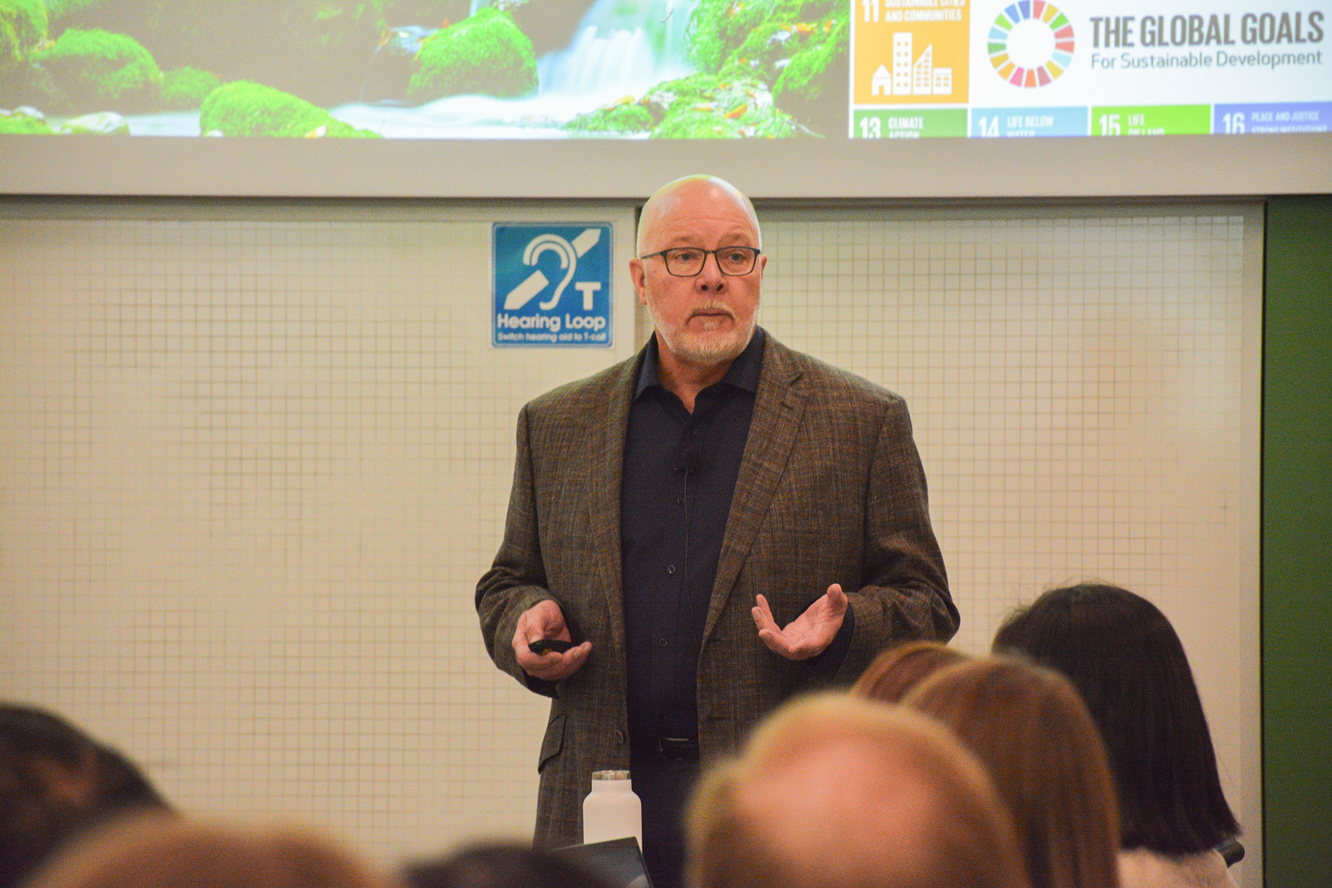 Gerald Shurson presents the keynote address to a group of faculty, staff and students.