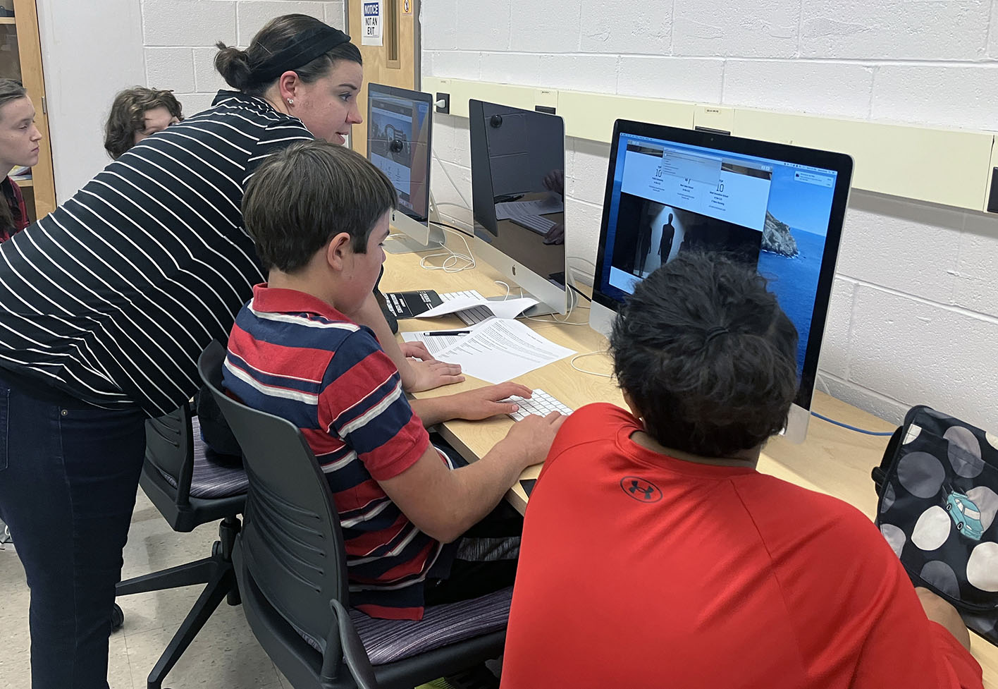 Students work in a computer lab