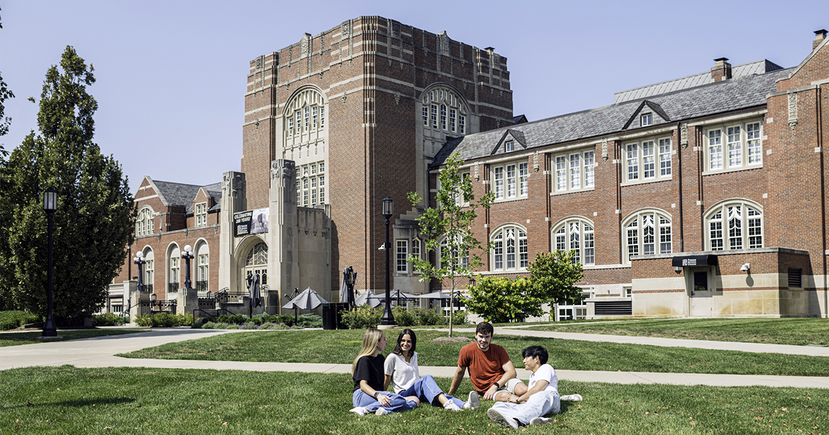 Students study in front of the Purdue Memorial Union