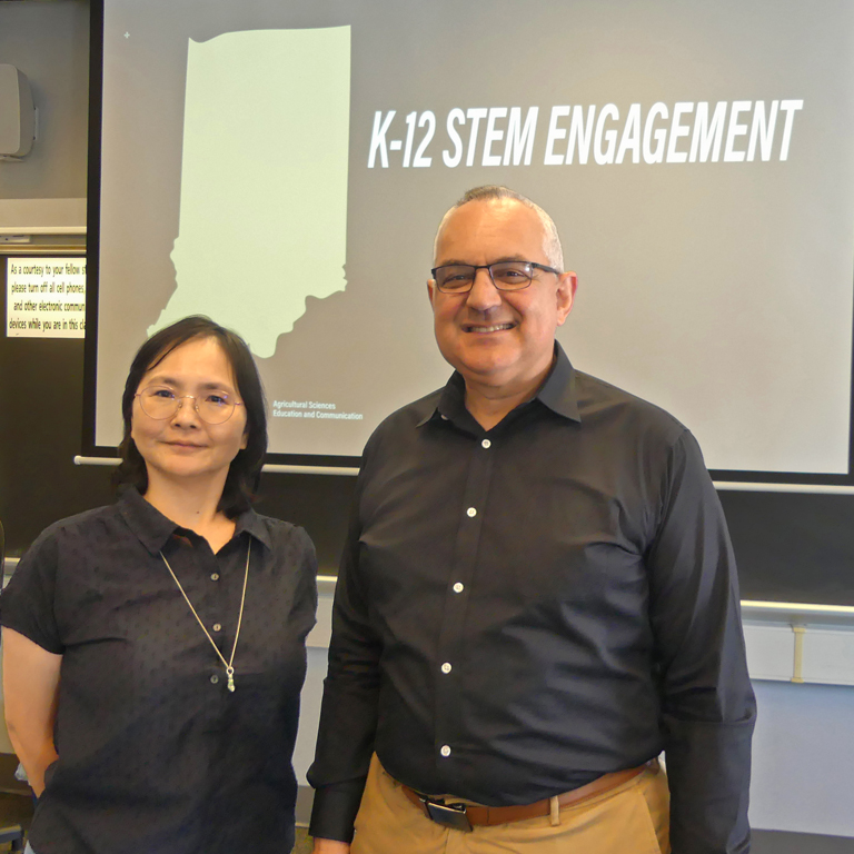 Drs. Wang and Knobloch in a classroom