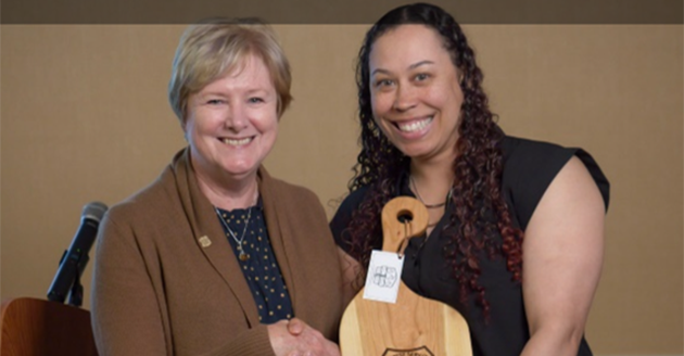 Lawson (right) receives the Women of Color STEM community service award from Kendall Harris, senior director of equity advancement at YMCA of the Triangle, and Angela Stribling, radio host (WHURfm California) and host and producer of nationwide Awareness Campaigns such as Celebrating Black History Vignettes. 