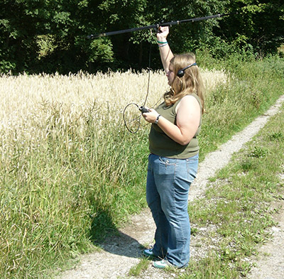 Geriann Albers holds radiotelemetry equipment