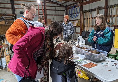 Allie Johnson talking about herpetology at the 2023 Community Nature Day.