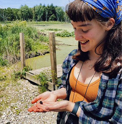 Allie Johnson with a salamander