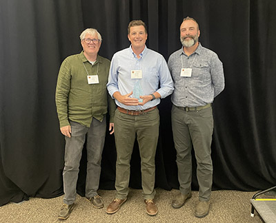 Jarred Brooke is presented with the Eastern Oak Forests Conference career achievement award. 
