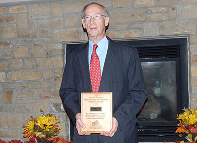 Ken Day with his John F. Datena Distinguished Forester Award