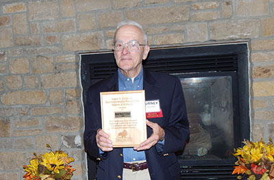 Burney Fischer with his John F. Datena Distinguished Forester Award