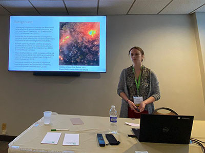 Katy Dix presents on wildfire management at the IASNR conference