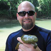 Dr. Rod Williams holding hellbender.