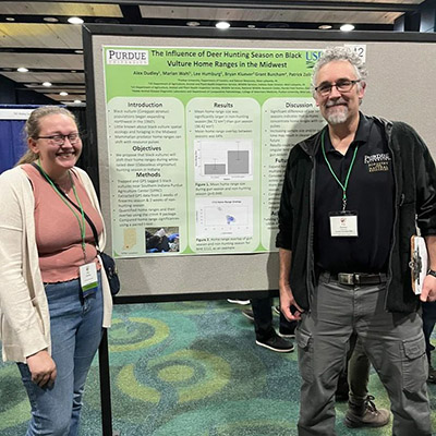 Dudley with Dr. Pat Zollner at her poster presentation at the TWS Conference