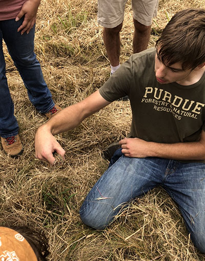 Russell Duke holds a frog on a TWS outing to Kankakee Sands State Park