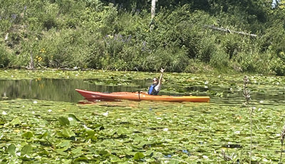 Addy Ellis in a canoe as part of her mandatory training through the National Park Service. She had to demonstrate that she could kayak on the waters within the park.