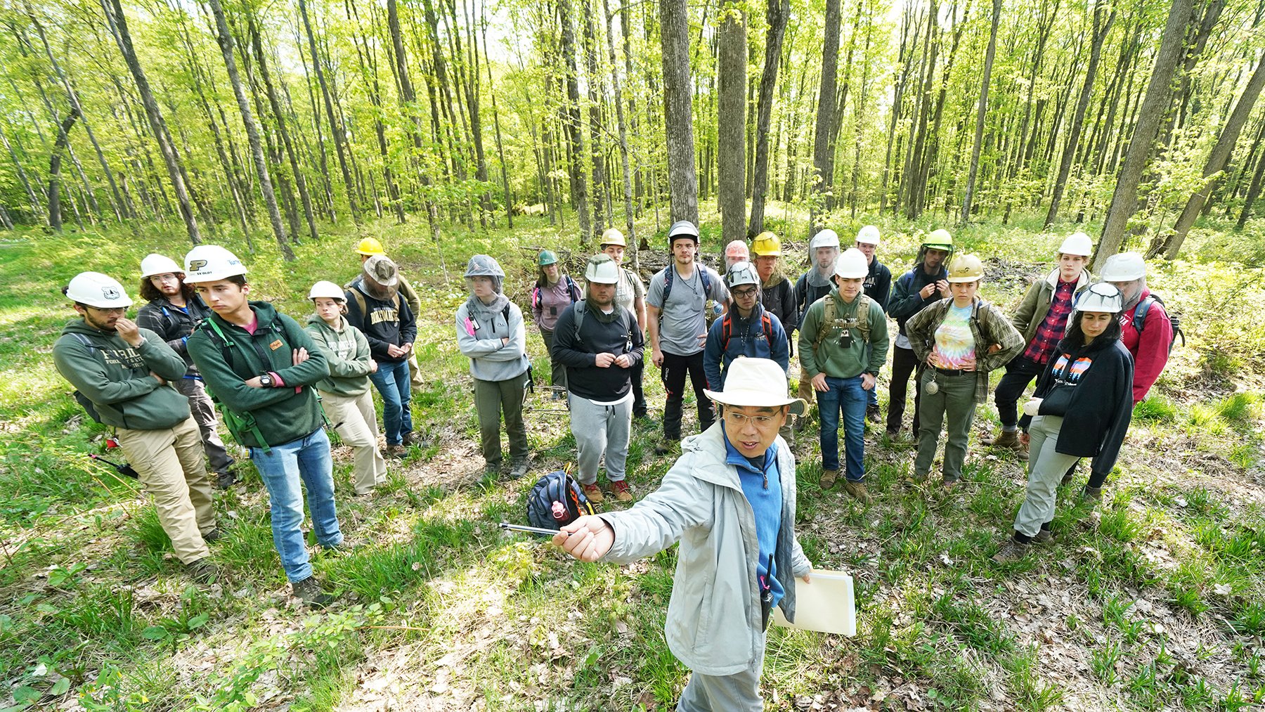 Dr. Songlin Fei and students in forest at the FNR Summer Practicum.