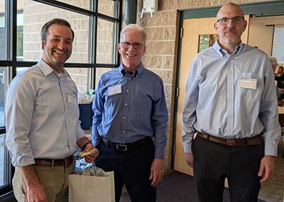 Zach Feiner with Drs. Rob Swihart and Tomas Hook