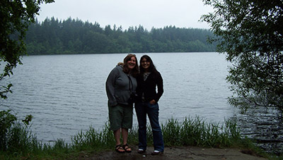Kristin Floress stands in front of a body of water with a friend in 2006. 