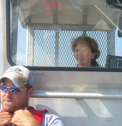 Carolyn Foley driving a boat