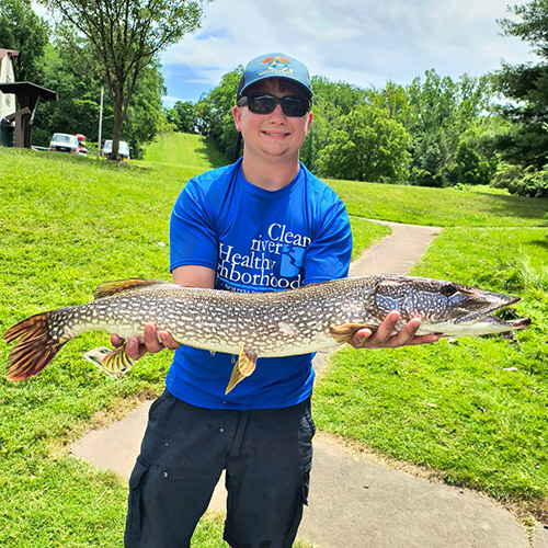 Noah Haas holds a large snapping turtle; Noah holds a largemouth and smallmouth bass; Noah Haas holds a large bullfrog