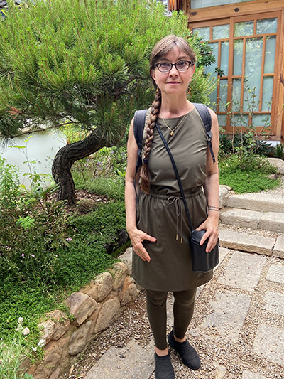 Dr. Eva Haviarova stands next to a tree in Korea