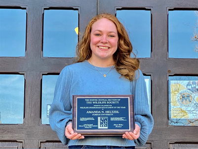 Amanda Heltzel with Award