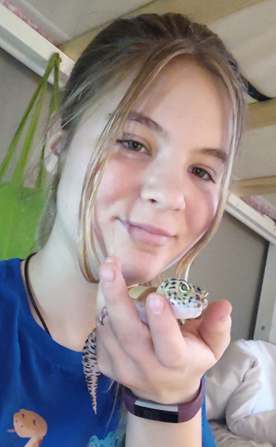 Krystal Kramer holds a gecko