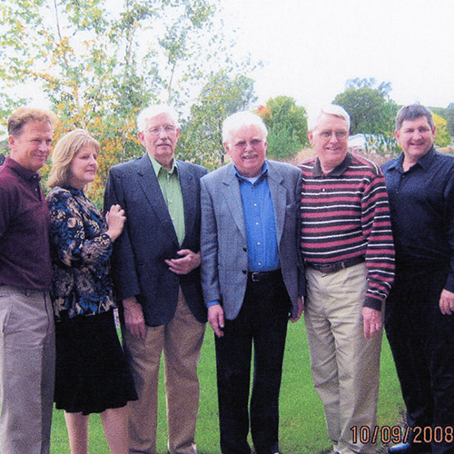 Julian Hutchinson at home on leave from the Army before the Korean War; Hutch with family members in 2008; the cover of Hutch's new book An American Hero