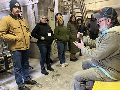 The Indiana LSLA group talks with a farmer during an in-person session.