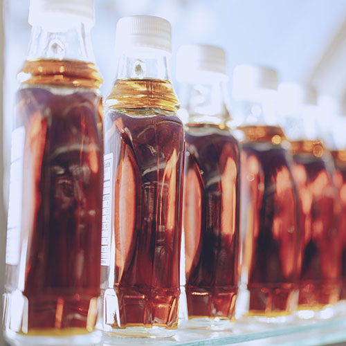 Bottles of Indiana maple syrup