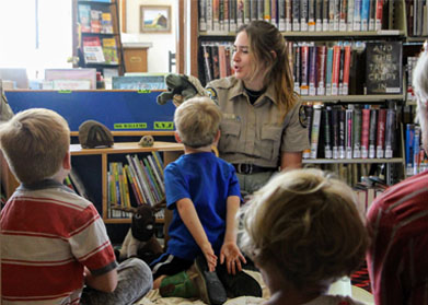 Emma Johnson giving a Leave No Trace puppet show for the local library.