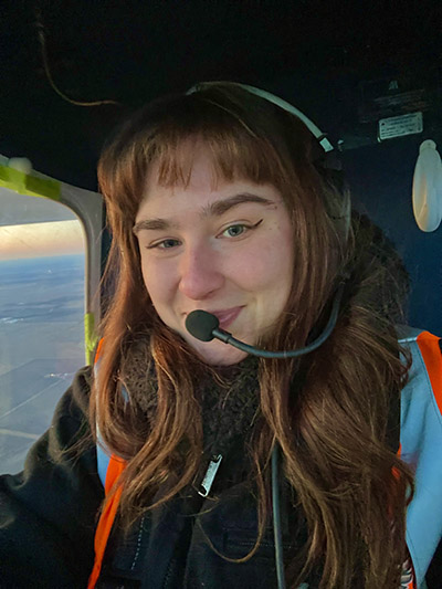 Emma Johnson sits in the Sky Arrow airplane
