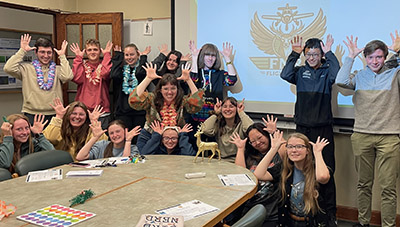 Emma Johnson shown with all of the pilots and techs from her research team.