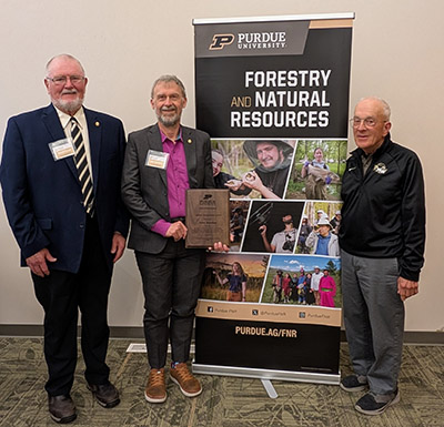 Dr. John Kershaw (middle) with Dr. Dave Hyink and Dr. Burney Fischer in April 2025.