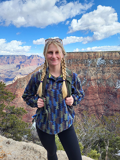 Madison Kresse poses in front of a canyon