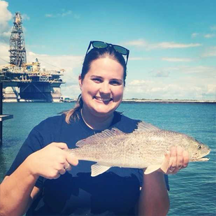 Lizz Allmon holding fish, Pathmaker award.