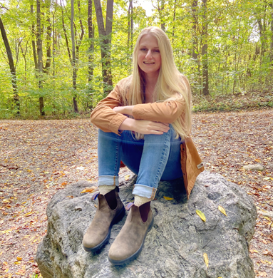 madison-kresse-sitting-on-a-rock-in-the-forest