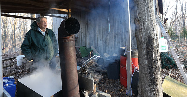A maple syrup producer at work