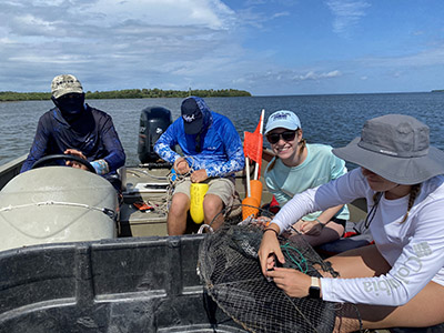 Senior Rachel Krause on a boat with fellow students