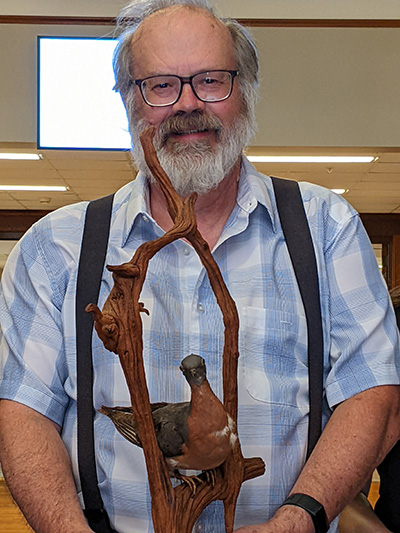 George the passenger pigeon with Dr. Barny Dunning