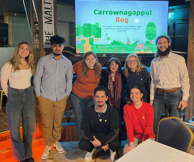 Bog group after presentation. From left to right, Emma Luedke, Luis Campos, Alex Weidman, Marie Gilmore (nature guide), Madelyn Lopp, Bryan Stapleton, Juan Lozano and Arlene Polar