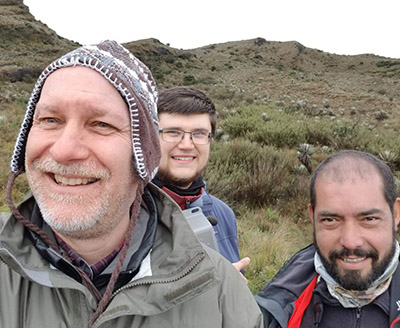 David Savage, Dr. Bryan Pijanowski, and Dr. Oscar Laverde prepare to deploy a sensor in the Paramos of Chingaza National Park, Colombia