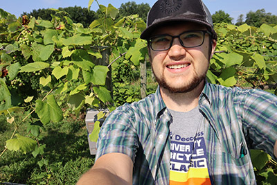 David Savage deploys a Wildlife Acoustics Song Meter 3 at Dulcius Vineyard in Indiana