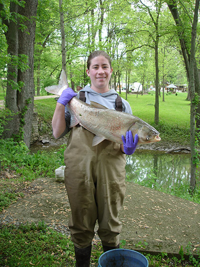 Alison Coulter with an adult silver carp