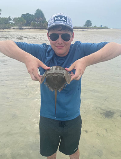 Steven Kelly with a turtle