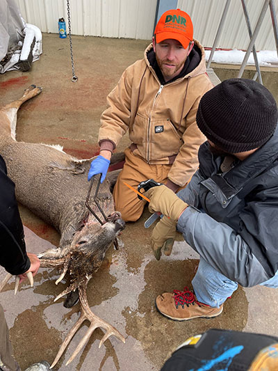 Stoelting at a deer check station in 2022