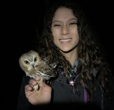 Tabitha Olsen holding a small owl