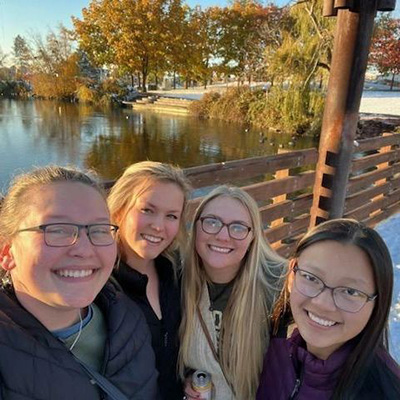 Alex Dudley, Ashlanna Murray, Lauren Wetterau and Anne Talbot pose outside the TWS conference in Spokane, Washington