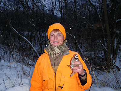 Janke holds a Northern bobwhite in Ohio 
