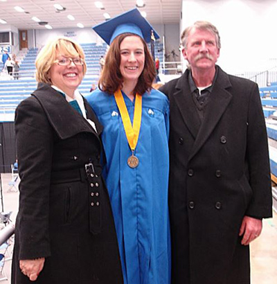 Emily with her parents Glory and Jeff Boersma at her undergraduate graduation ceremony at Eastern Illinois University in December 2010. 